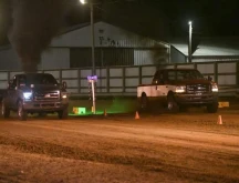 Photo of Two Trucks at a KOI Drag Racing Event.