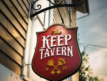The Keep Tavern logo sign.
